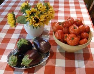 eggplants, sunflowers and tomatoes