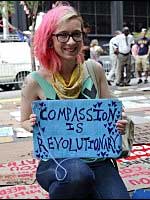 Girl with Wall Street Protest Sign